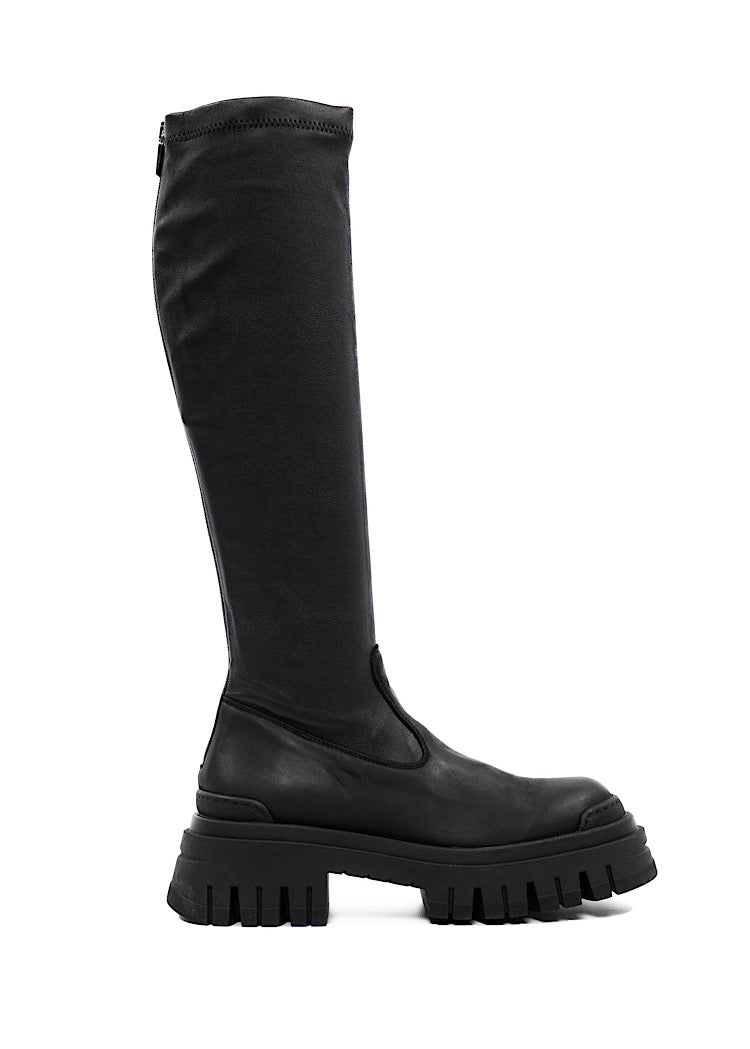 An angled profile of a long chunky Black Boot with a distinct sole.