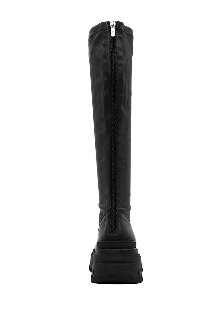 A back profile of a long chunky Black Boot with a distinct sole.
