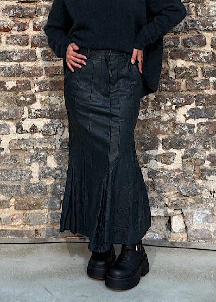 ASYMMETRIC FLARED LEATHER SKIRT