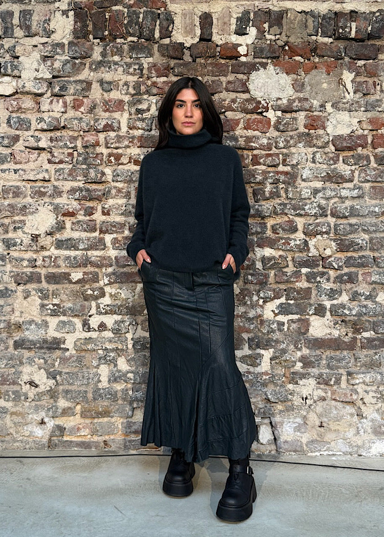ASYMMETRIC FLARED LEATHER SKIRT